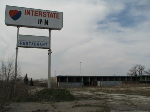 As of April, 2009, the facility still stands, though some (empty) storage containers have now been lined up along the west building wing.
