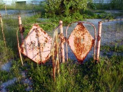 Gated area inside the playground where the carousel stood.