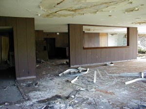 The restaurant. Cashier in the back, drink preparation area on the left, kitchen on the left (out of picture). Taken while standing in the courtyard though a now missing picture window.