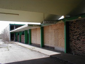 The boarded up lobby entrance.