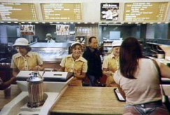 At right, Ray stands behind the counter in a typical late 1970’s to early 1980’s McDonald’s restaurant.
