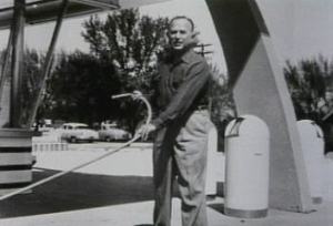 Ray cleaning the sidewalk of his first McDonald’s franchised store in Des Plaines, Illinois.