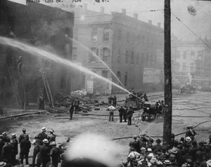 prestofirelarge The Prest-O-Lite factory at 211 East South Street in Indianapolis burns in 1907. The explosion also blew up a sauerkraut plant nearby, spraying wet kraut all over the block. The city passed an ordinance forbidding the filling of the gas canisters within city limits, so Fisher built a giant new plant in what would become Speedway, Indiana. Photo from the W. H. Bass Photo Company Collection (9490), courtesy Indiana Historical Society.