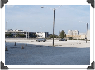 As of April 2009, it’s still a parking lot. What a waste.