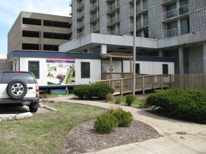 sheraton22large As of April 2009, a portable trailer now sits tucked under the awning of the hotel, promoting a fresh plan for redevelopment.