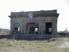 stsation6large The East end of the main building. The overgrown upper platform is on the left, and the express freight building behind the photographer.