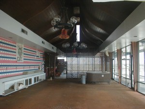 Looking through the west windows.  Front door is on the right, dining area in the back.